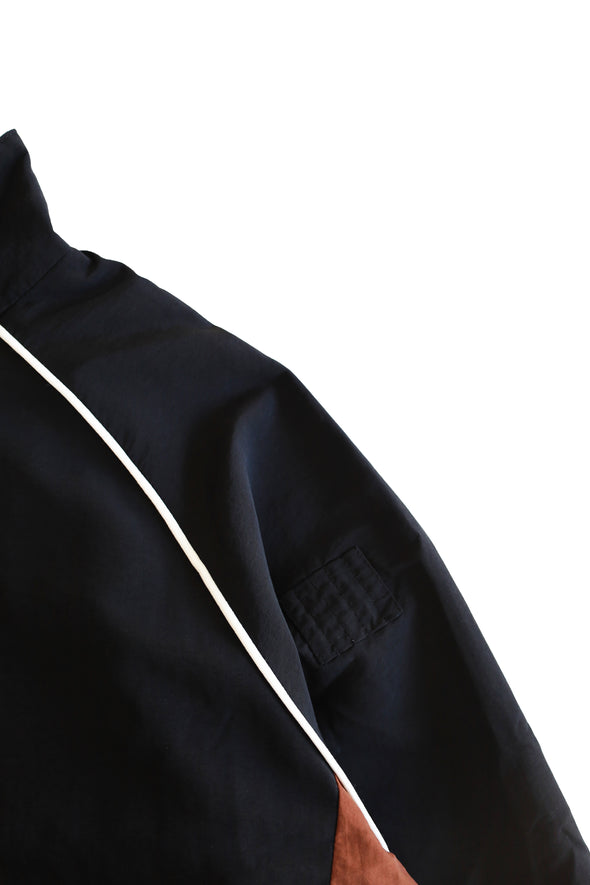The Green Nylon Windbreaker